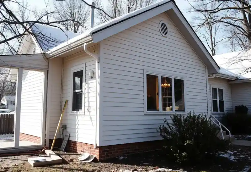 Illustration of house with new horizontal lap siding in a 1980-era home